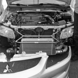 Black & white of Justin's Evo 8 with the front bumper off